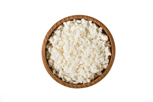 istock Fresh ottage cheese in wooden bowl 1406903681