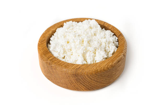 istock Fresh ottage cheese in wooden bowl 1406903688