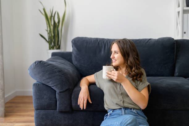 istock Attractive curly young woman enjoys weekend 1406904787