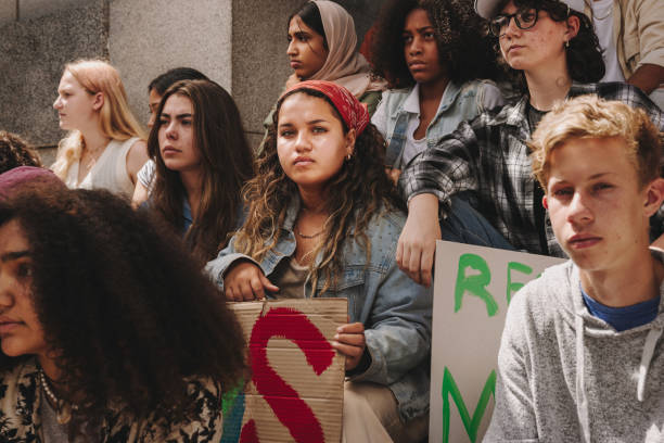 istock Young people fighting against global warming and climate change 1406904863