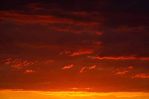 istock Colorful clouds of various shades on sunrise sky. Abstract and dramatic clouds background. 1406906758