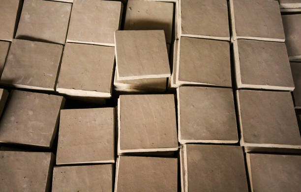 handmade bricks in traditional style freshly molded, laid out to dry. traditional office. Galicia, Spain