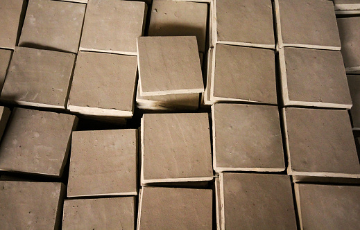 Fez, Morocco-September 23, 2013: Square clay pieces stacked on top of each other.