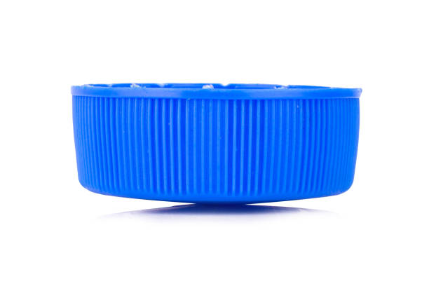 istock bottle cap plastic isolated on white background color blue 1406909788