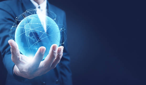 istock Businessman holding in hands with global connection concept. Energy saving concept, Elements of this image furnished by NASA 1406911144