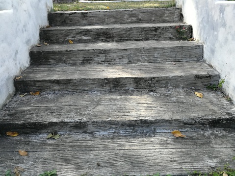 Weathered staircase in the outdoor garden, walkway.