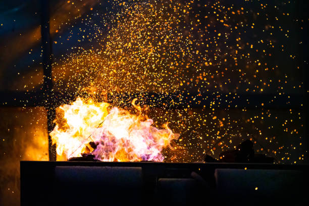 istock Flame and fire spark with bokeh on dark abstract background 1406913202