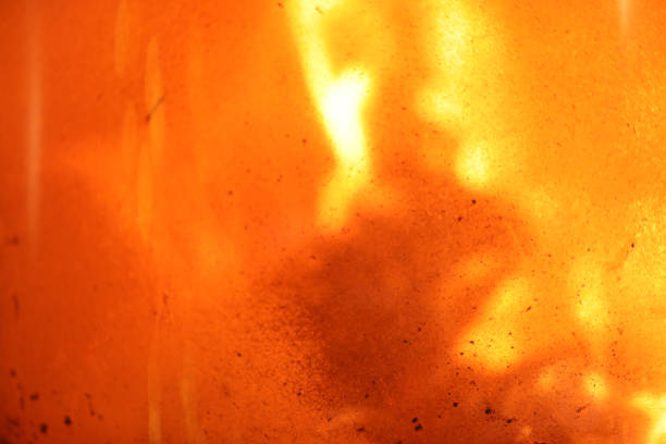 Oven fireplace with a fire behind the pane