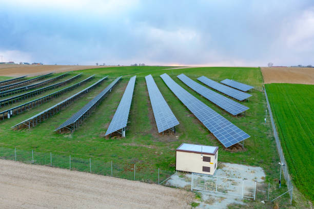 istock Electric substation next to solar panels, electric booth 1406914606