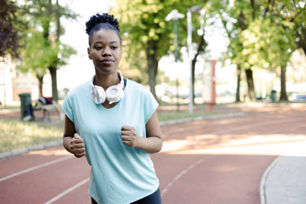 istock Portrait of a young female runner on training 1406915238
