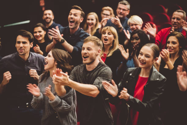 istock Happy audience applauding in the theater 1406915921