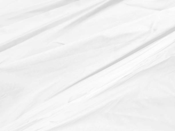 istock Clean fashion soft fabric textile woven beautiful abstract smooth curve shape decorative white and gray background 1406916754