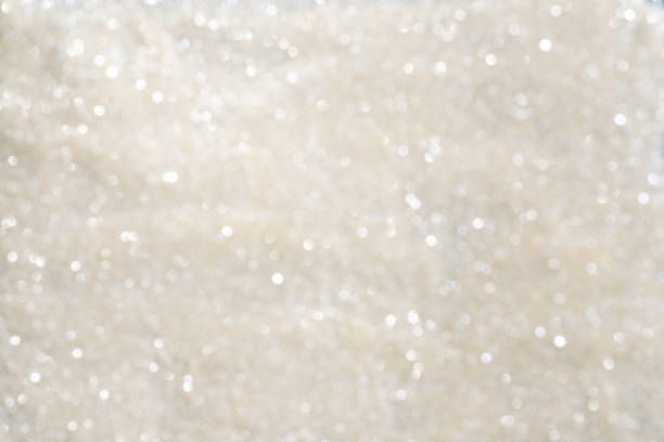 Beautiful light golden unfocused bokeh. Celebration holiday background