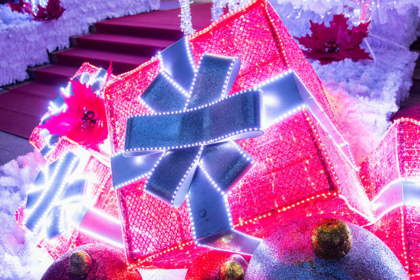 istock Close up of shiny  christmas gift boxes present decoration. 1406919174