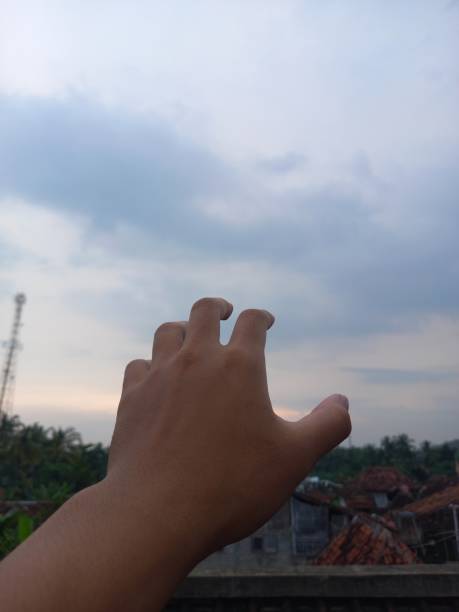 istock hands that want to reach for something 1406920346