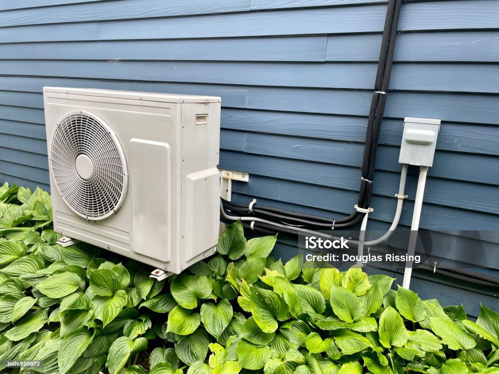 Mini-Split AC and Heat Mini-Split AC and Heat System Air Conditioner Stock Photo