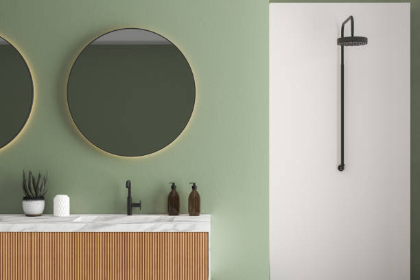 istock Comfortable white marble basin with oval mirrors are standing on wooden countertop 1406922778