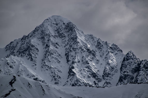 istock Gloomy lone mountain in overcast 1406924878
