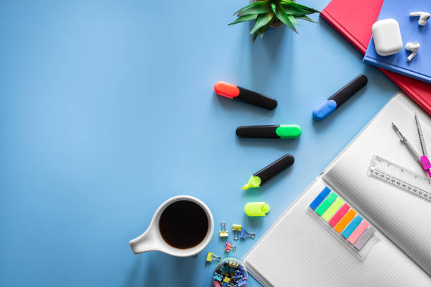 istock School supplies stationery on a blue background, copy space. 1406926827