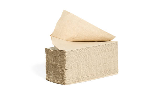 istock light brown tissue paper in layers Wipes clean, stacked in layers, on a white background. 1406927752