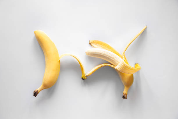 istock Two bananas on a white background isolated, conceptual minimalism. 1406928955