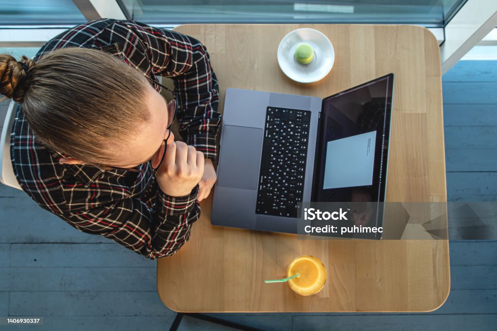 Man Using A Computer Top View A Man Works At A Computer Top View Stock Photo - Download Image Now ...