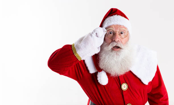 istock Santa Claus in eyeglasses is looking surprised at camera on white background 1406932447