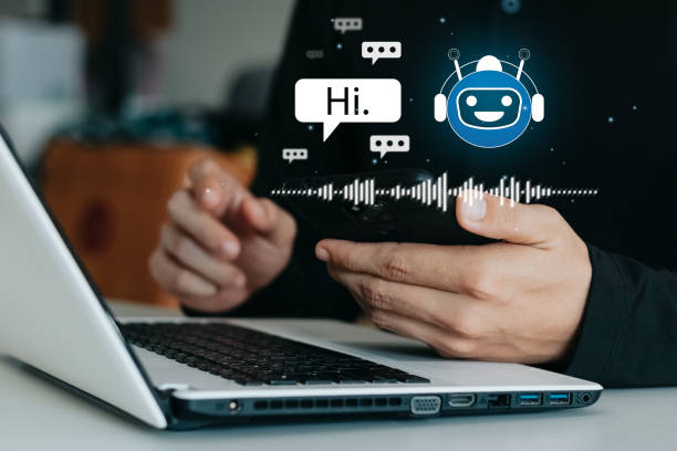 istock Businessmen use chat balls on mobile phones to get access to information and network data, robot applications and global connectivity, artificial intelligence, innovation and technology. 1406934741