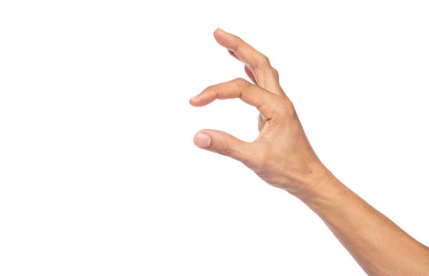 istock Close up man hand picking something isolated on a white background with clipping path 1406934932