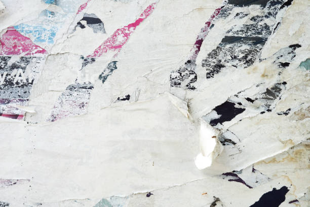 istock abstract torn paper poster on the wall for background texture. 1406936753