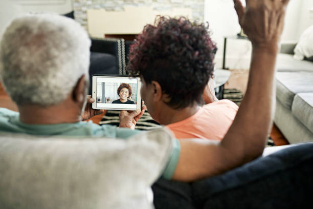 istock Black family connecting on mobile device 1406942053