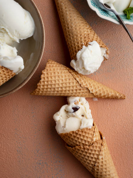 istock Ice Cream,  Ice Cream Cones, Vanilla and almonds Ice Cream in a Cone 1406942885