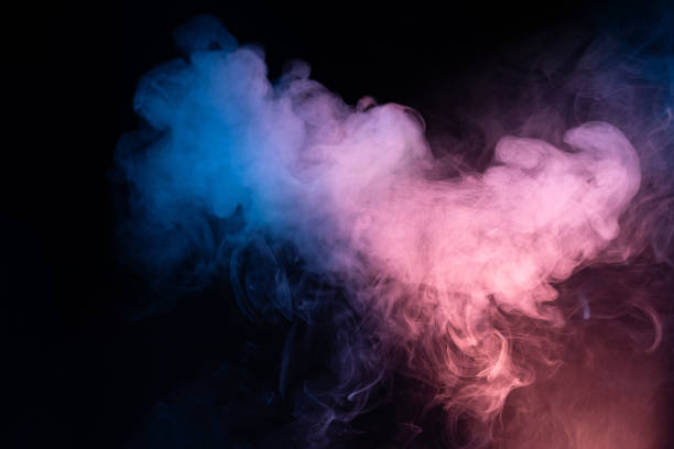istock Blue and pink steam on a black background. 1406943159