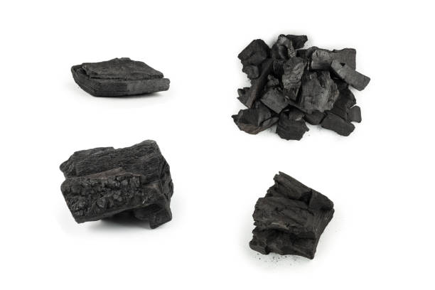istock Black oak coal isolated on white background. 1406943187