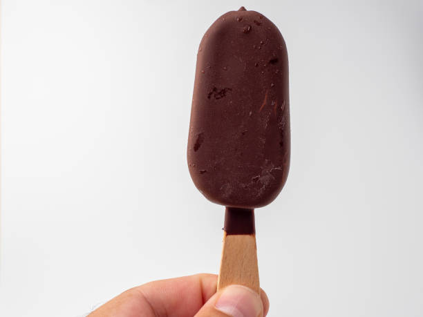 istock Chocolate Ice Cream on a stick. Ice cream on a white background. 1406944494