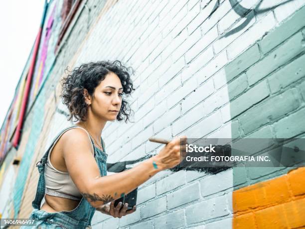 Female Artist Painting Large Wall Mural Stock Photo - Download Image Now - Mural, Painting - Activity, Artist