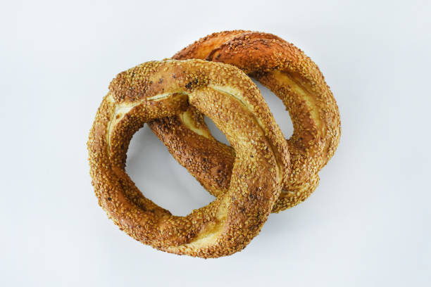istock Turkish bagels, simit on the white background 1406946912