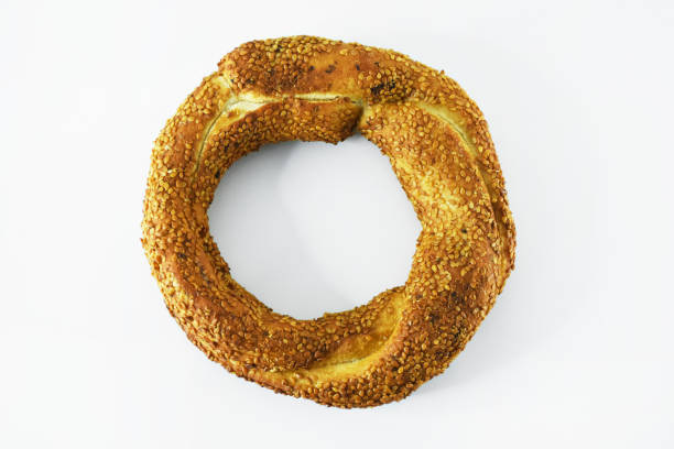 istock Turkish bagel, simit on the white background 1406947030