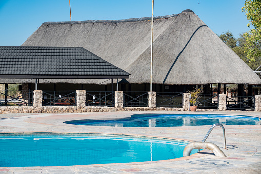 Swimming Pool at the government-owned Okaukuejo safari camp in Etosha National Park in Kunene Region, Namibia