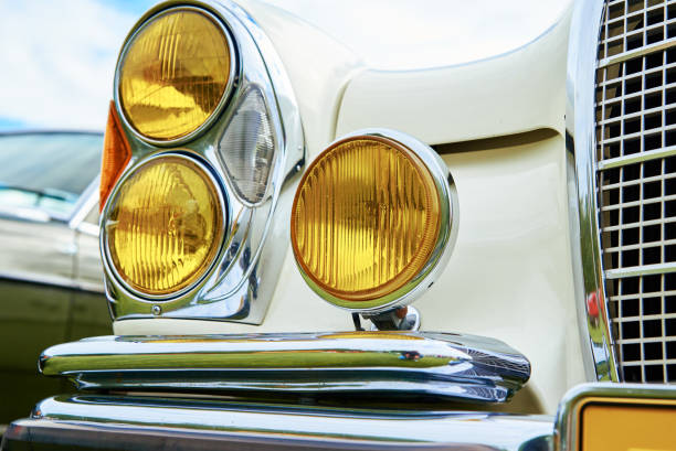 istock Closeup headlight of retro car 1406948654