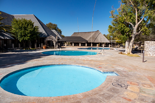 Swimming Pool at the government-owned Okaukuejo safari camp in Etosha National Park in Kunene Region, Namibia