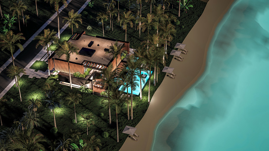 Luxury Villa Exterior With Swimming Pool And Lounge Chairs At Night