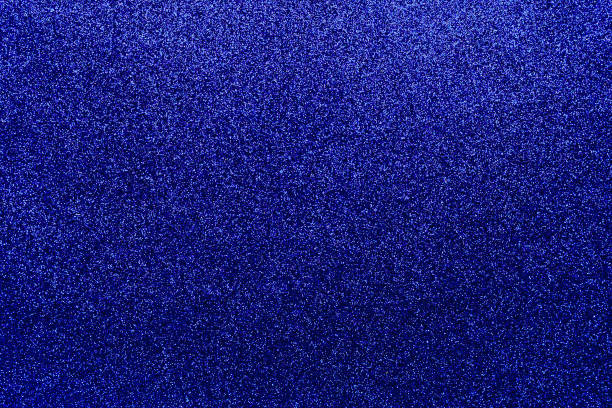 istock Background with sparkles. Backdrop with glitter. Shiny textured surface. Very dark blue 1406956595