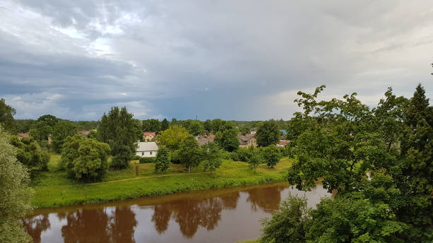 istock summer landscape to the city through the trees 1406958351