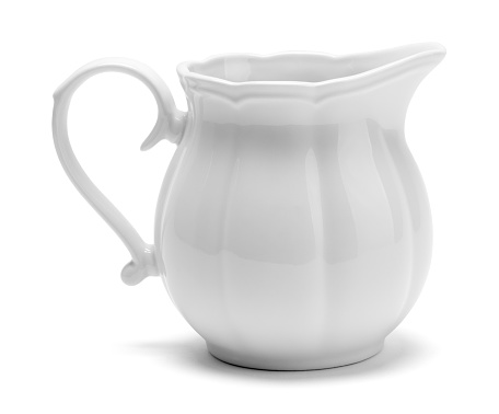 Small Fancy Ceramic Milk Pitcher Cut Out on White.