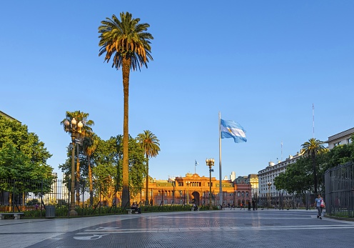 Buenos Aires, Argentina, November 19, 2019: La Casa Rosada (Pink House), officially known as Casa de Gobierno (Government House) or Palacio Presidencial (Presidential Palace) at sunset. It is the official residence and seat of the Argentine President's Office. The Casa Rosada sits at the eastern end of the Plaza de Mayo.