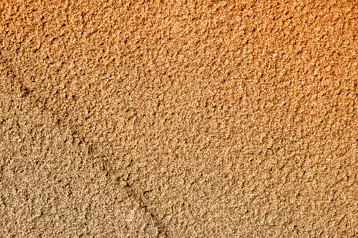 Texture of sand on the beach after low tide
