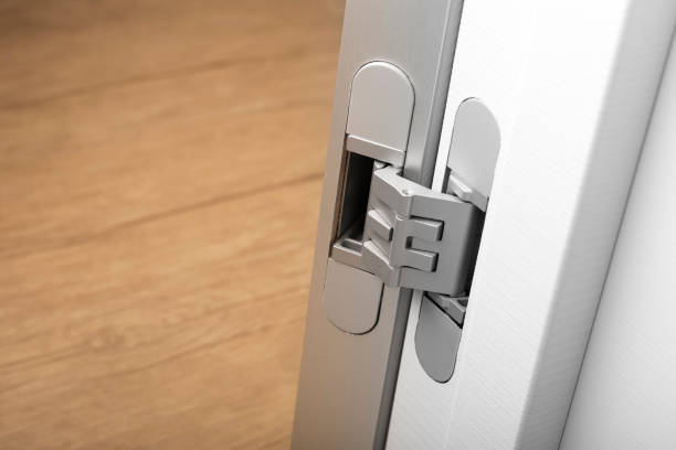modern aluminum door hinges on white doors, close-up - 合頁 個照片及圖片檔