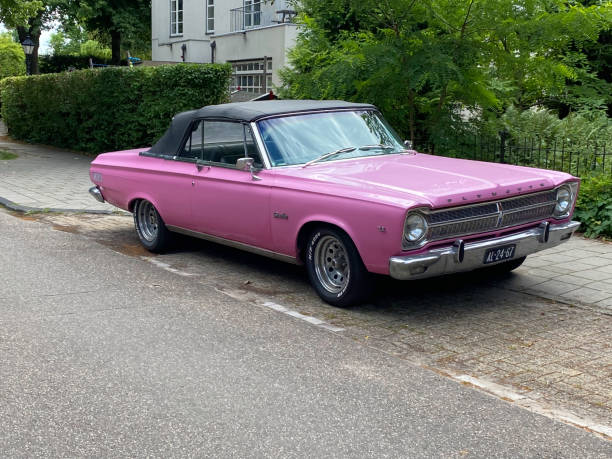 Santpoort, the Netherlands, - July 01, 2022.  Classic American Plymouth  parked in the street of the city.