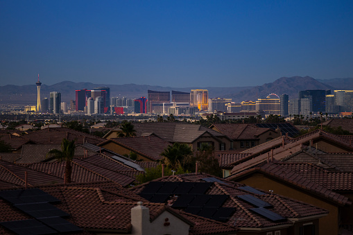 A view of the world famous Las Vegas Strip with homes in the foreground